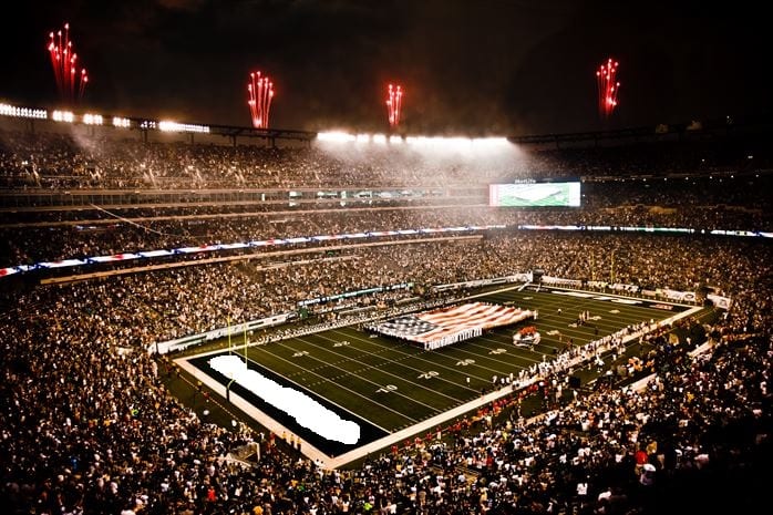 Service members unfurl flag at NY Jets first home game in new stadium
Marines, Sailors, Coast Guardsmen, Airmen and Soldiers unfurled an American Flag across the field during a pre-game ceremony before the New York Jets vs New York Giants game, Aug. 16, East Rutherford, N.J. The game was the first football game in New Meadowlands Stadium, the newly built home of both New York football teams. (Official Marine Corps photo by Sgt. Randall A. Clinton / RELEASED)
(Touchdown text was edited)